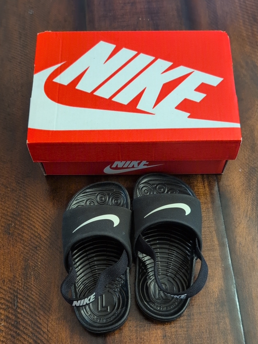 Nike Kids Black Slide Sandals with White Swoosh and Heel Strap